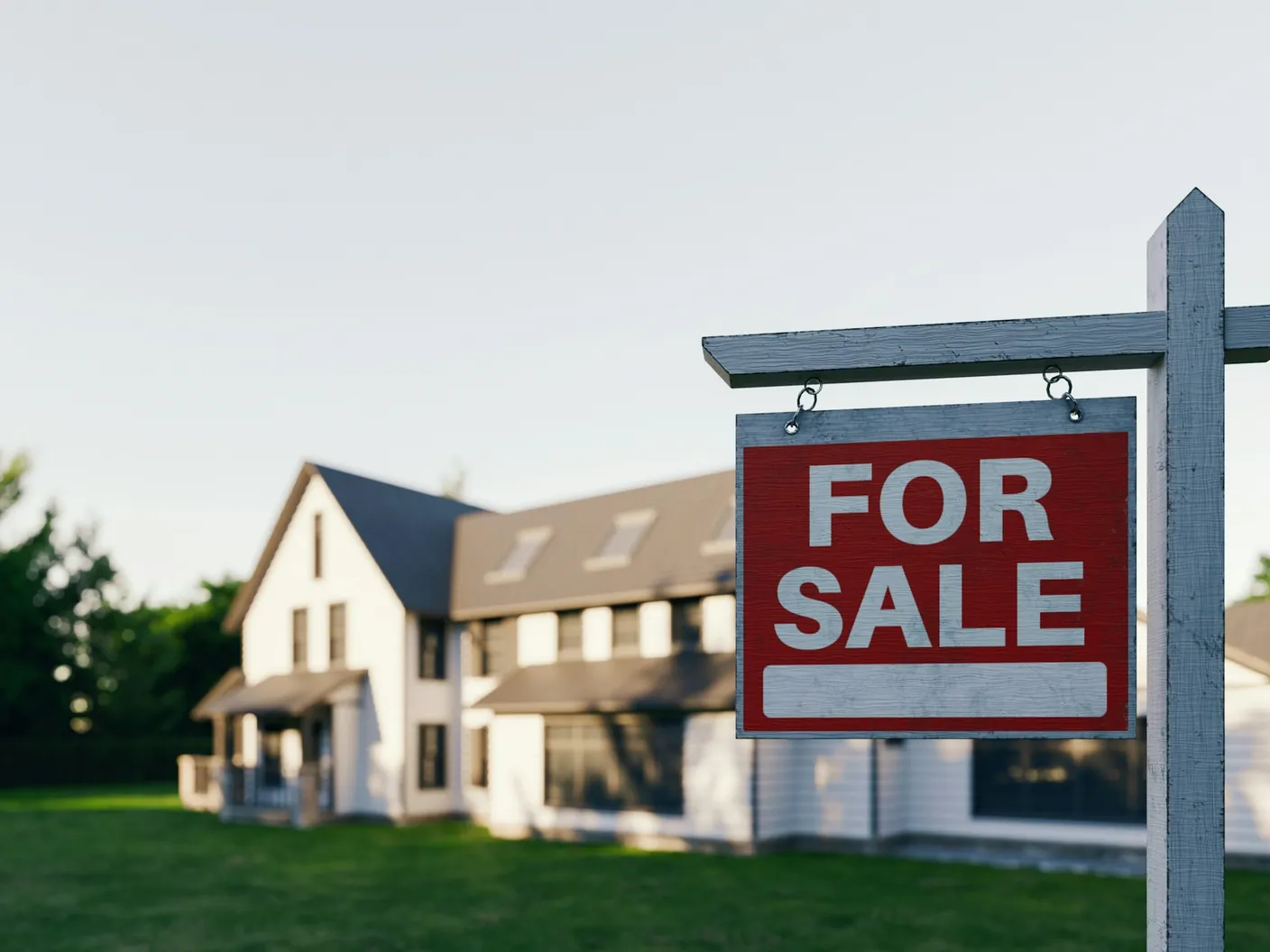 House for sale in Mirabel in 2026 with a sign in a residential Laurentians neighbourhood.